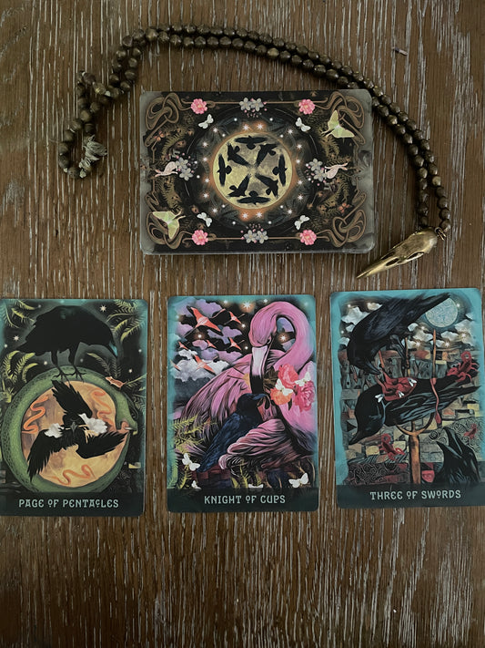 The Building Blocks Tarot Spread: Page of Pentacles, Knight of Cups, and Three of Swords